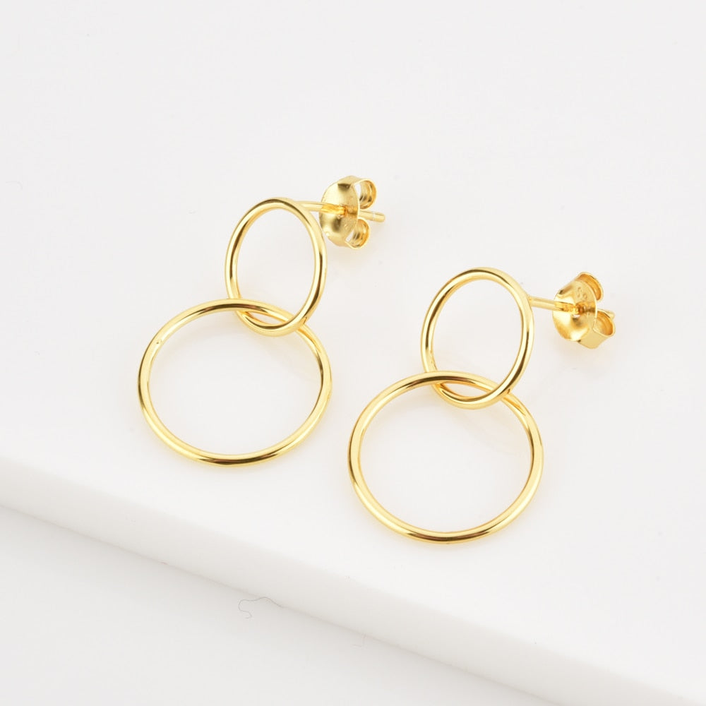 Two Gold Earrings